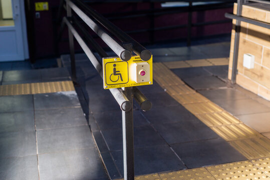 Wheelchair ramp and emergency button for people with disabilities