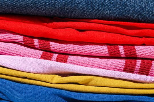 Stack of Colorful Folded Fabrics Clothes