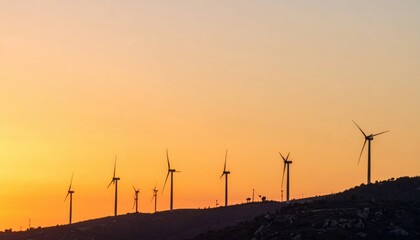Obraz premium Wind turbines generating renewable energy at sunset renewable energy farm nature landscape scenic view sustainable development