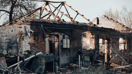 Fototapeta premium destroyed and burned houses in the city in Ukraine