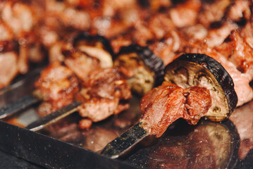 grilled shish kebab on skewers, close-up view, fried meat, delicious food
