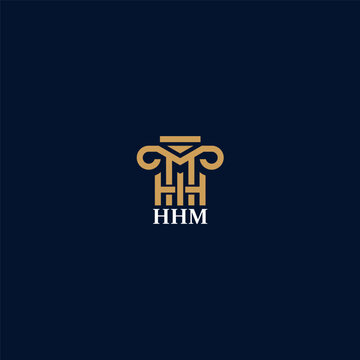 Elegant Architectural Hhm Logo Mark Rendered In Gold Against A Dark Blue Backdrop Striking Design