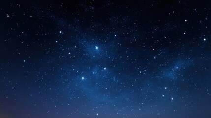 Fototapeta premium A breathtaking view of a dark night sky filled with countless twinkling stars, creating a serene and magical atmosphere.