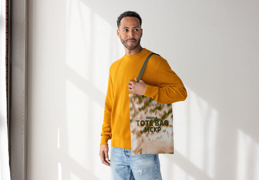 Man With Tote Bag in Casual Scene. PSD template ready for Mockup