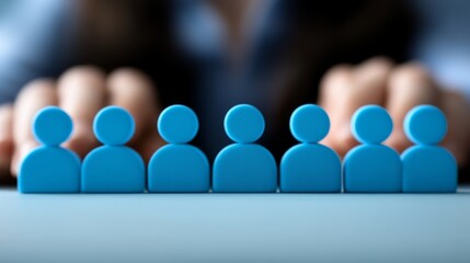 Row of stylized blue figures representing a team.