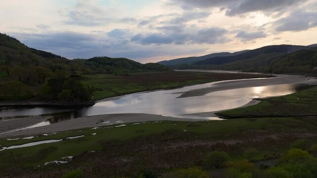Afon Mawddach Estuary Tidal Channels and Mudflats in Snowdonia National Park Wales during sunset