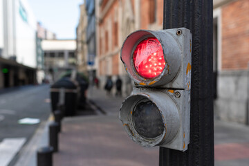 Detail of an old red traffic light