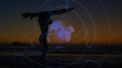 woman carrying surfboard walking beach at sunset, with tech globe overlay showing data trails - Powered by Adobe