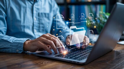 Man Typing On Laptop With Digital Document Management Concept