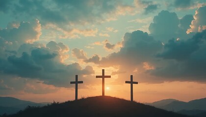 Fototapeta premium Three crosses on hill at sunset
