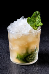 Classic Mint Julep Cocktail on black background