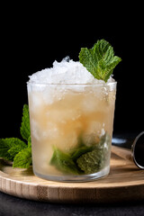 Classic Mint Julep Cocktail on black background