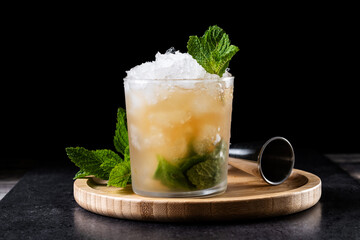 Classic Mint Julep Cocktail on black background