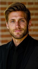 Obraz premium A man in a suit and tie standing in front of a brick wall
