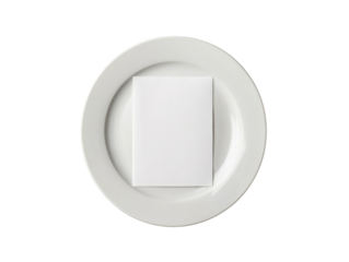 Elegant dining setting featuring a blank card on a white plate, cut out