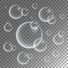 Set of colorful soap bubbles for design creation. Isolated, transparent, realistic soap bubbles on transparent background.