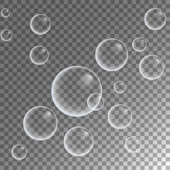Set of colorful soap bubbles for design creation. Isolated, transparent, realistic soap bubbles on transparent background.