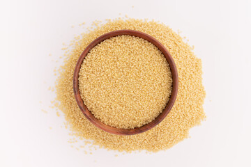 dry couscous isolated on white