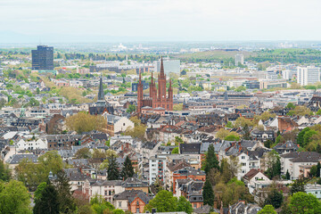 A city view of Wiesbaden in Germany with a large red building of Market church in the middle