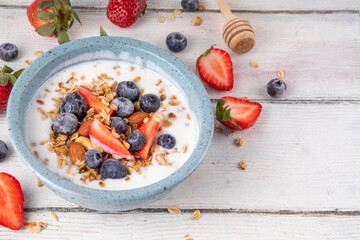 Sweet Homemade Breakfast, Greek Yogurt bowl with Granola and Berries