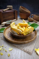 Fresh Ripe Jackfruit Pieces crackers in a Wooden Bowl on Rustic Table