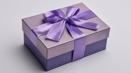 Obraz premium Lilac-colored gift box with satin ribbon, rectangular shape, placed against a plain white background, soft lighting adds warmth