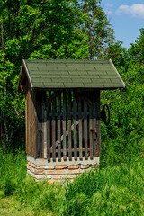 Old traditional water well in nature