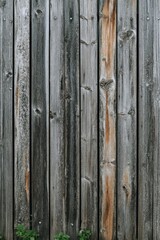 Weathered wooden planks fence