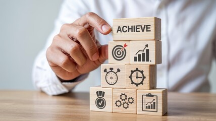 Wooden blocks stacked high with success icons.