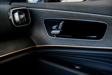 Car door with door handle and window control and adjustment button