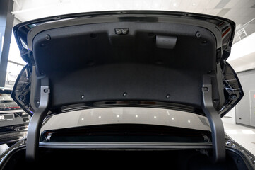 Large black empty car trunk. Open car trunk close up