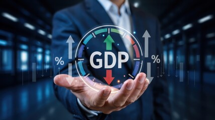 Businessperson holds a glowing GDP representation.