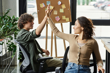 Engaging colleagues share a moment of inspiration in a modern office workspace
