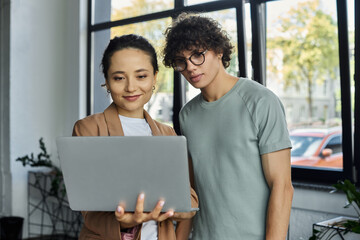 Collaborative professionals engaged in meaningful work within a bright modern office setting