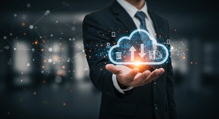Naklejka premium Professional man in a suit presenting a digital cloud storage icon with data upload and download symbols in a modern office environment, showcasing technology and innovation in data management.