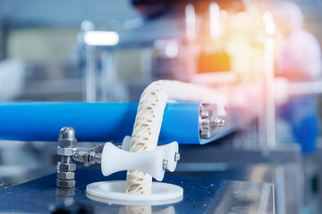 Automated puff pastry production, dough formation and conveyor process in confectionery with...