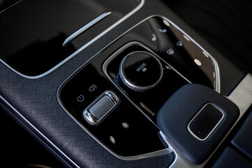 Naklejka premium Automatic transmission selector in the interior of a modern car.