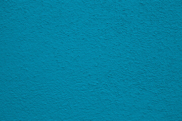 Background - grain texture cyan light blue paint wall. abstract grainy decorative navy light monochrome wallpaper backdrop. plaster stucco cement texture. Abstract with copy space for design