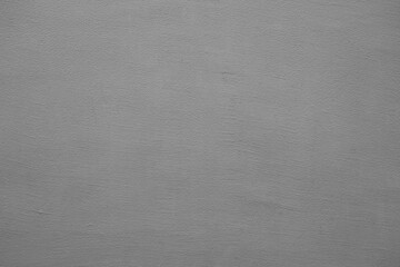 grey gray beige stucco wall texture, peach fuzz color background. Abstract artistic backdrop for design.  color ribbed,  plaster, pattern.