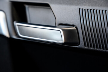 Car door with door handle and window control and adjustment button
