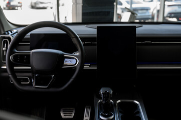 Car interior - steering wheel, shift lever and dashboard. Car modern inside.