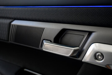 Car door with door handle and window control and adjustment button