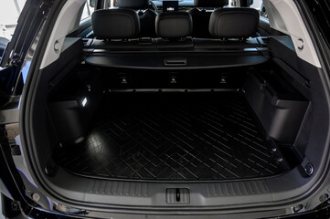 Large black empty car trunk. Open car trunk close up