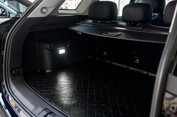 Large black empty car trunk. Open car trunk close up
