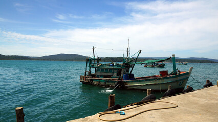 Fisherman's boat at sea. Poor fishing boat.