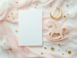 Blank Greeting Card Mockup with Wooden Rocking Horse and Gold Stars. Baby Shower Invitation Template with Toy Horse and Moon. Elegant Flat Lay with Card, Sheer Fabric, and Baby-Themed Decor