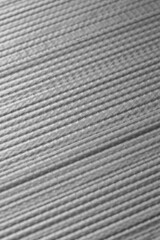 Close-up of strips of grey duct tape, or gaffer tape, background. Strong waterproof industrial tape concept