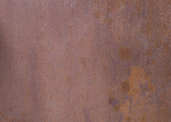 Rusty weathered steel surface with stains