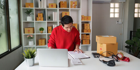 Small business owner managing inventory and packaging orders