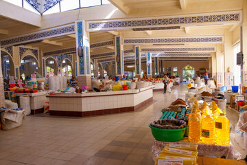 A large open market with many different types of food and goods for sale
